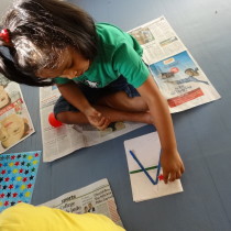 Participant busy with a craft activity - Toddler Art. 