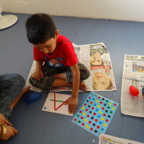 Participant busy with craft activity - Toddler Art. 