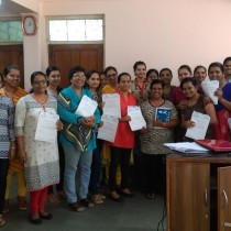 Participants of the teacher training at Little's with their certificates. 